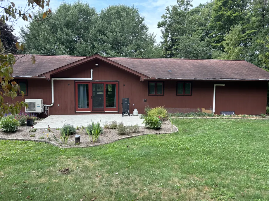 Whole house with neat Fujitsu exterior line routing and ductless system